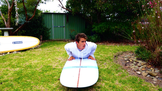 How to Perfect Your Paddling Position on a Surfboard to Catch More Waves